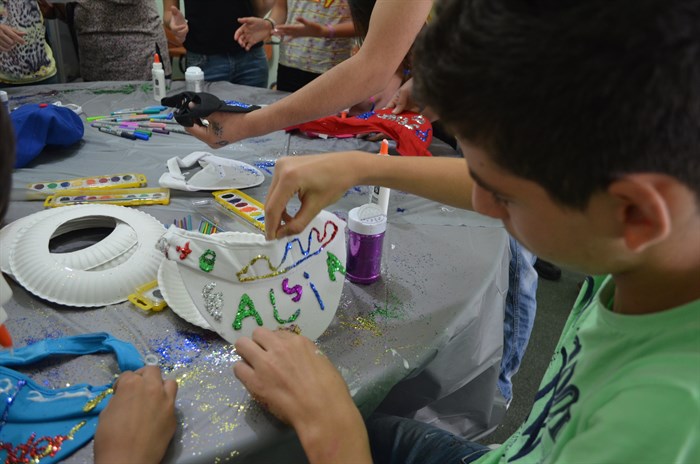 Older children get to express their creativity through an art project during BCYM's weekly programming.