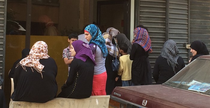 Syrian refugee women waiting to receive free medical services from a church-based ministry in Northern Lebanon (Photo: Ashley al-Saliby)